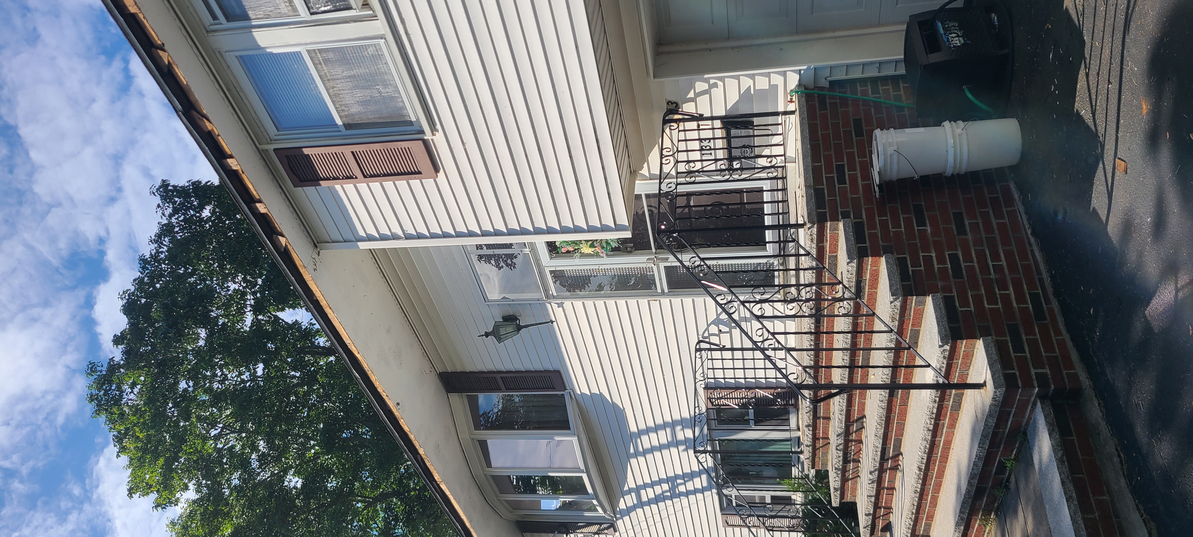 Fascia damage on split-level home before repair