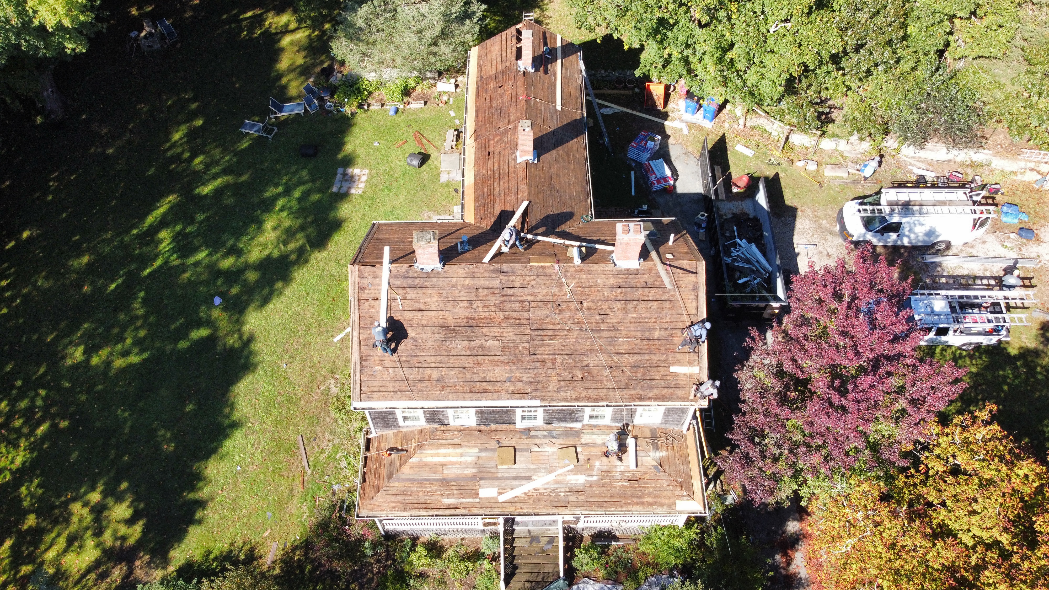 Roof replacement in progress, aerial view